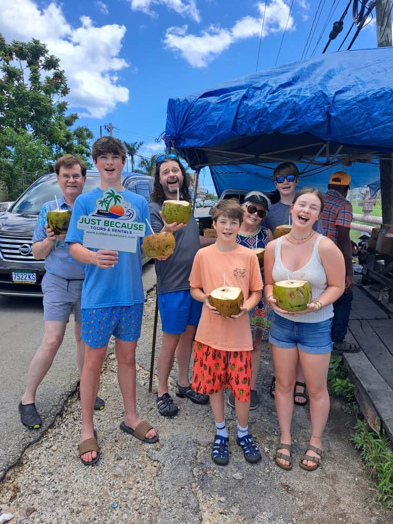 Family enjoying Coconut Water with Just Because Tours