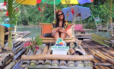 Just Because Tours client enjoying Bamboo Rafting